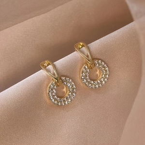 Elegant gold-plated geometric circle drop earrings with shimmering micro-paved zircons