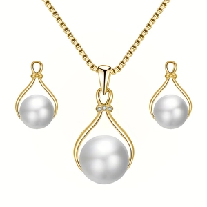 Parure de bijoux de mariée dorée avec perles blanches et accents en cristal étincelants