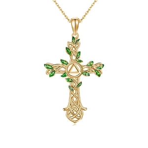 Golden Celtic cross necklace with green enamel leaves and tree of life hollow design