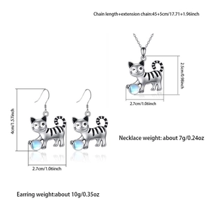 Conjunto de joyas de gato lindo con collar y pendientes de plata y piedra luna azul
