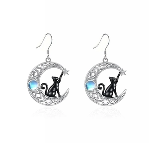 Close-up of S925 sterling silver crescent moon earrings with black cat and moonstone charm