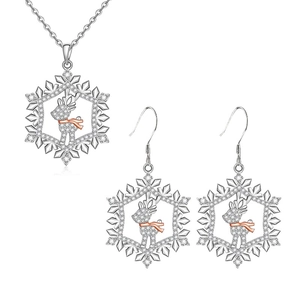 Schmuckset mit Schneeflocke und Rentier bestehend aus Kette und Ohrringen