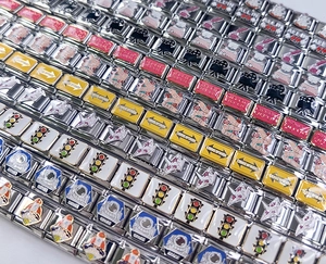 Detailed view of various 9mm Italian charm links featuring colorful enamel patterns