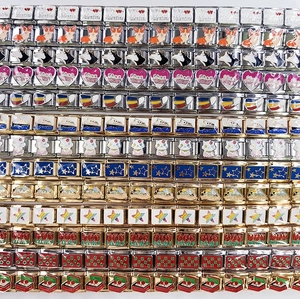 Detailed grid of stainless steel Italian charms with colorful enamel animal and text patterns