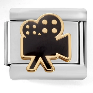 Detail of Italian modular charm link with a vintage movie camera design in gold and black