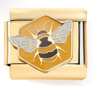 Macro detail of 18K gold bumblebee charm link with colorful enamel wings and hive base