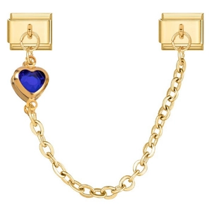 Detail of Italian charm bracelet safety chain with blue heart gemstone and gold links