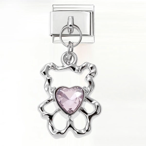 Detail of pink heart crystal inside a hollow bear charm for Italian bracelets