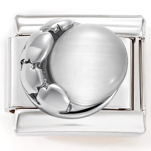 Macro shot of stainless steel Italian charm with white cat eye stone in claw setting