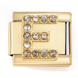 Macro view of a gold-plated stainless steel letter E charm with white zircon stones