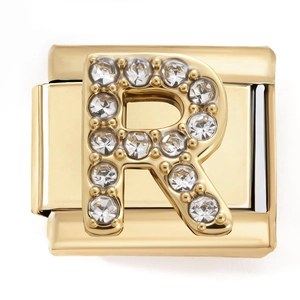 Detailed close-up of golden letter R pendant with sparkling zircons and a polished finish