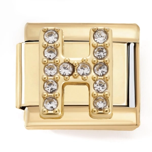 Macro shot of gold-plated modular link charm with sparkling Zirconia H letter inlay