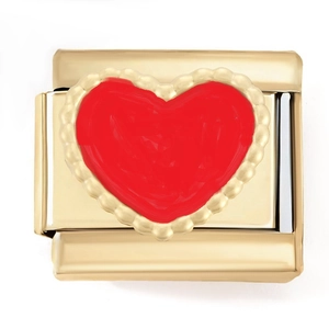 Detailed macro shot of a gold modular charm link featuring a red heart with beaded edges