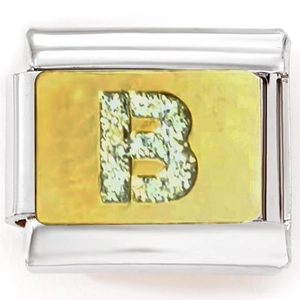 Macro shot of 9mm stainless steel modular charm link with a golden glittery letter B charm