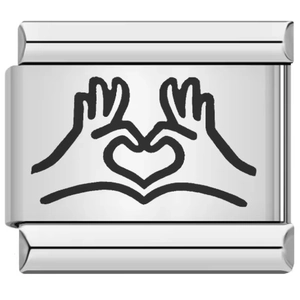 Macro detail of Italian modular charm with hands heart gesture on stainless steel link