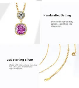 Detailed macro view of S925 sterling silver stamp and lobster clasp on gold necklace