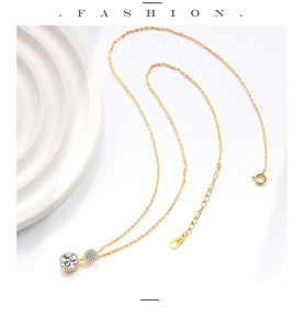 Detailed close-up of S925 silver gold necklace with square and round zircon pendants