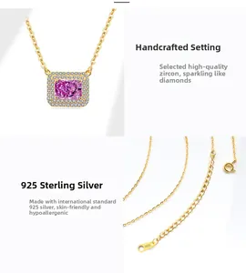 Close-up of S925 sterling silver stamp on golden necklace with pink zircon stone