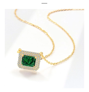 Detail shot of square emerald pendant necklace with pavé zirconia and gold-plated chain