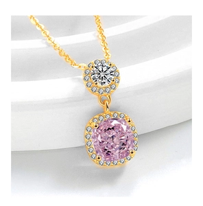Macro shot of gold double-layer necklace with pink cushion-cut and white round stones