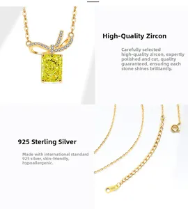 Detail view of S925 sterling silver stamp and yellow square zircon bow pendant