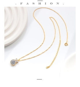 Macro detail of S925 sterling silver hallmark on golden chain with floral halo pendant