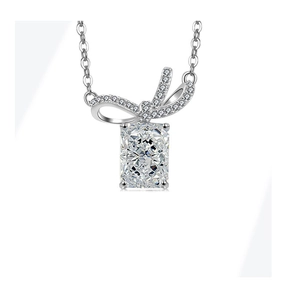 Detailed view of S925 silver necklace with ice flower cut square pendant and bow.