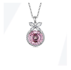 Close-up of S925 silver necklace featuring a round pink stone and diamond accents