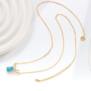 S925 sterling silver gold necklace with square blue gemstone and bow diamond pendant