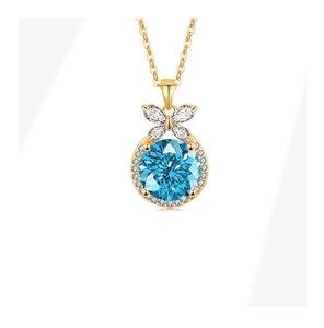 Detailed close-up of S925 silver necklace featuring a blue gemstone and butterfly pendant