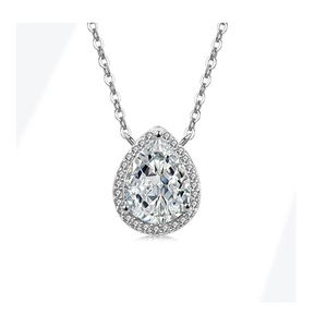 Macro detail of pear-cut waterdrop pendant with halo diamonds on S925 silver chain