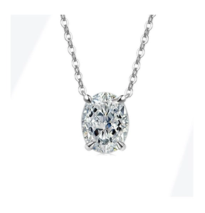 Close-up of an oval-cut gemstone necklace with a silver four-prong setting and O-chain