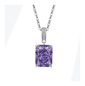 Macro shot of silver pendant necklace with large rectangular purple gemstone and zircon bails