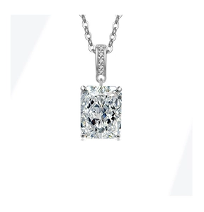Macro view of radiant cut gemstone pendant necklace with classic four-prong setting