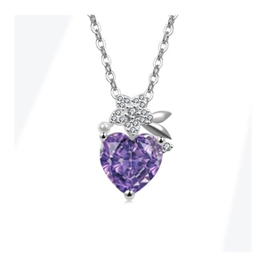 Close-up of purple heart gem necklace with silver flower and white pearl accents