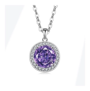 Macro shot of silver halo pendant with round purple amethyst and white accent stones