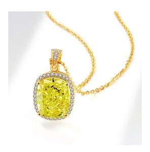 Vue détaillée du collier pendentif avec pierre jaune taille coussin et diamants