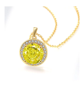 Close-up of a gold halo pendant necklace with a large round yellow gemstone