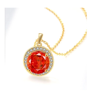 Macro view of a round red gemstone necklace with a sparkling diamond-encrusted gold halo