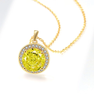 Golden halo necklace with a brilliant yellow center stone and pavé crystal border