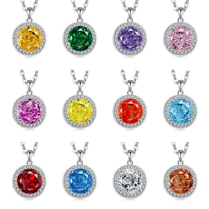 Classic round halo pendant necklaces set with vibrant gemstones in twelve colors