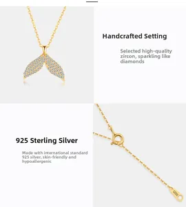 Macro detail of S925 sterling silver whale tail pendant necklace with pavé zircon