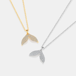 Elegant gold and silver fishtail necklaces with sparkling cubic zirconia on a fine chain