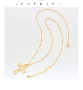 Close-up of S925 sterling silver stamp on golden hollow cross necklace extension chain