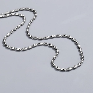 Polished S925 sterling silver beaded necklace with oval links in a minimalist style
