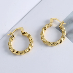 Elegant 925 silver twisted hoop earrings with a gold-plated finish and minimalist design