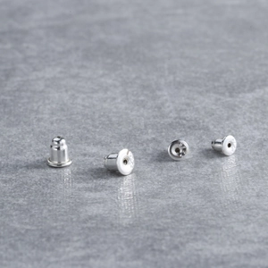 Set of four S925 sterling silver earring backs with a polished dome shape for jewelry making