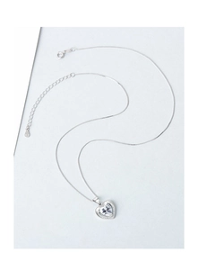 Detailed view of S925 sterling silver heart pendant with sparkling cubic zirconia stones