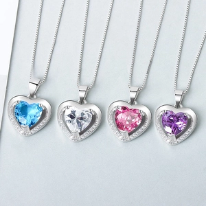 Sterling silver heart pendant necklace with colorful gems in blue white pink and purple
