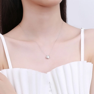 Minimalist S925 sterling silver necklace with a brilliant 1 carat round moissanite pendant